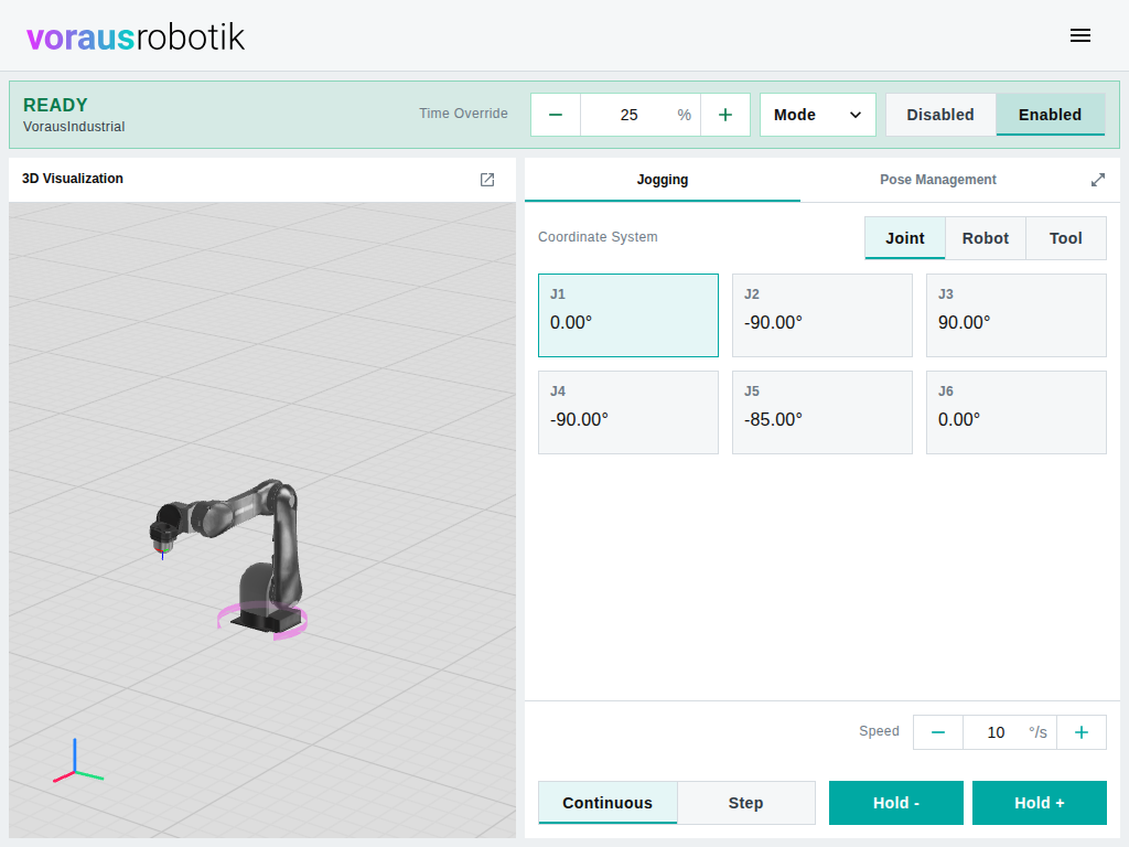 The dashboard with the Jogging tab open, joint J1 selected, and a magenta arrow around the first joint of the robot in the 3D visualization